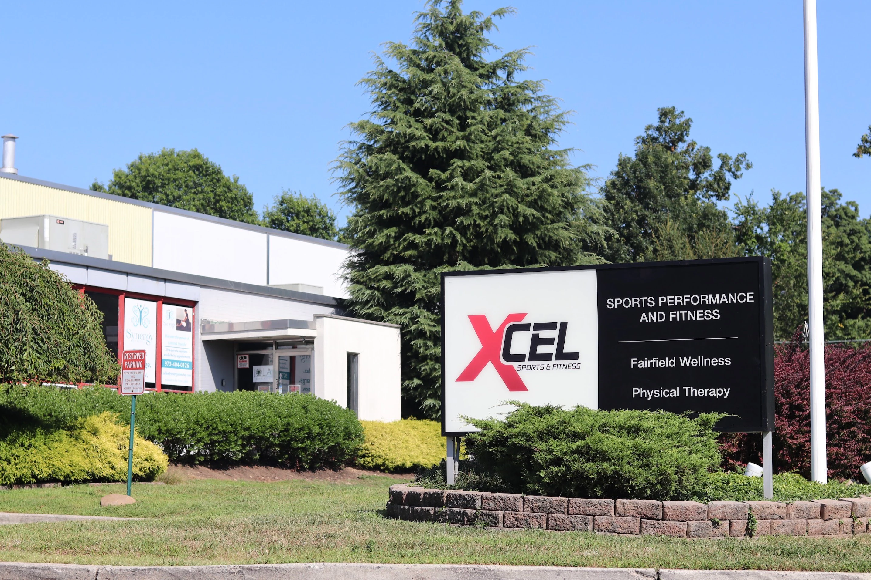 XCEL Sports & Fitness sign outside the gym at 25 W Greenbrook Rd in Fairfield, NJ